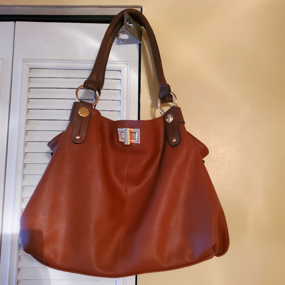 Kathy Ireland bag. Perfect for fall. Cognac and brown. Never used!